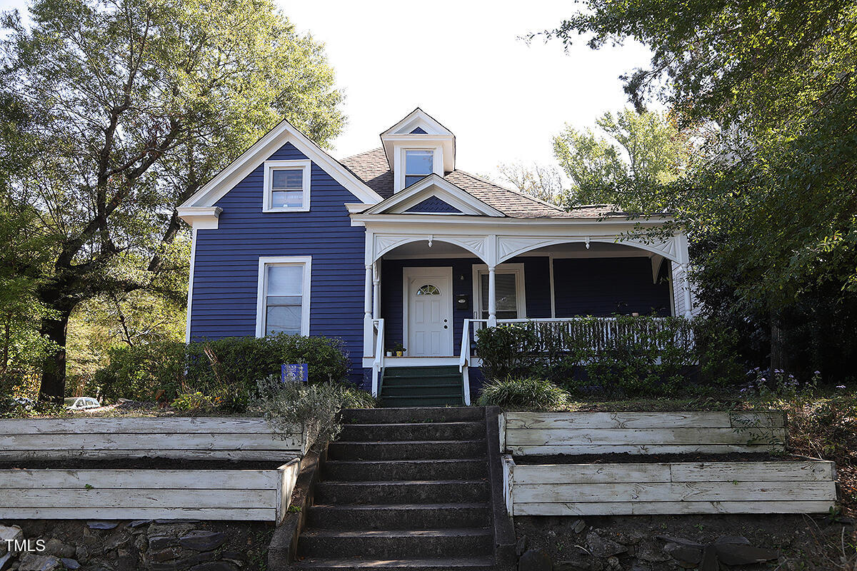 830 Onslow Street Durham, NC 27705 - Photo 1 of 10 a front view of a house with a yard