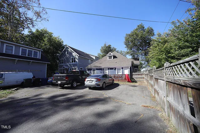 a view of a car in front of house