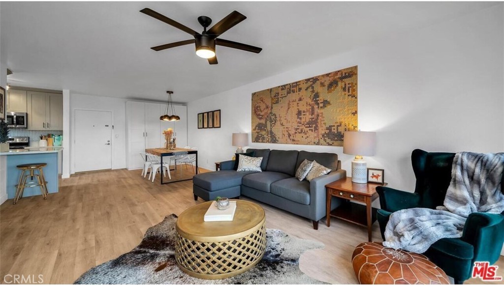 7742 Redlands Street, Unit H3025 Playa del Rey, CA 90293 - Photo 1 of 14 a living room with furniture and a rug