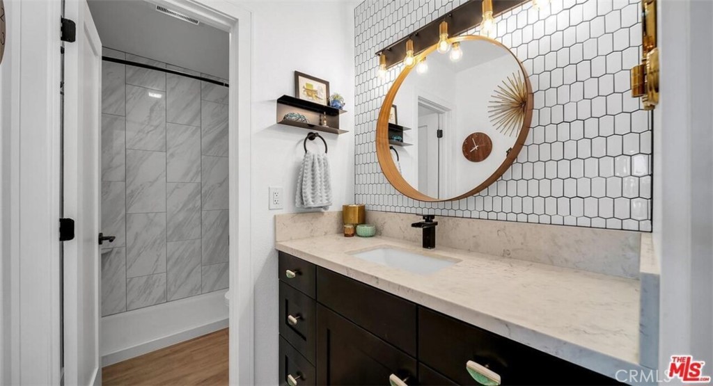 7742 Redlands Street, Unit H3025 Playa del Rey, CA 90293 - Photo 9 of 14 a bathroom with a sink and a mirror