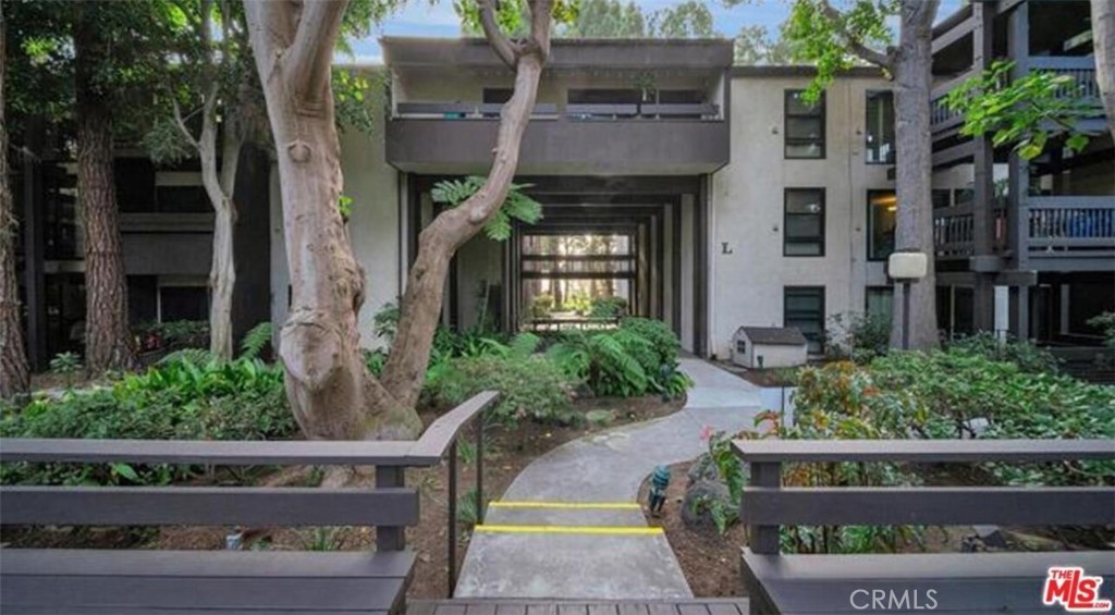 7742 Redlands Street, Unit H3025 Playa del Rey, CA 90293 - Photo 10 of 14 a front view of a house with a garden