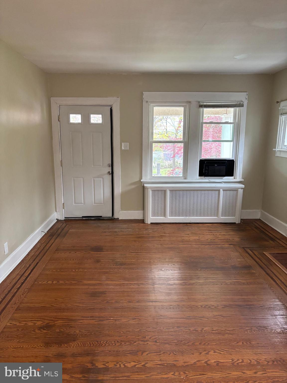 633 Edge Hill Road, Unit 1 Glenside, PA 19038 - Photo 3 of 13 a view of empty room with wooden floor and fan