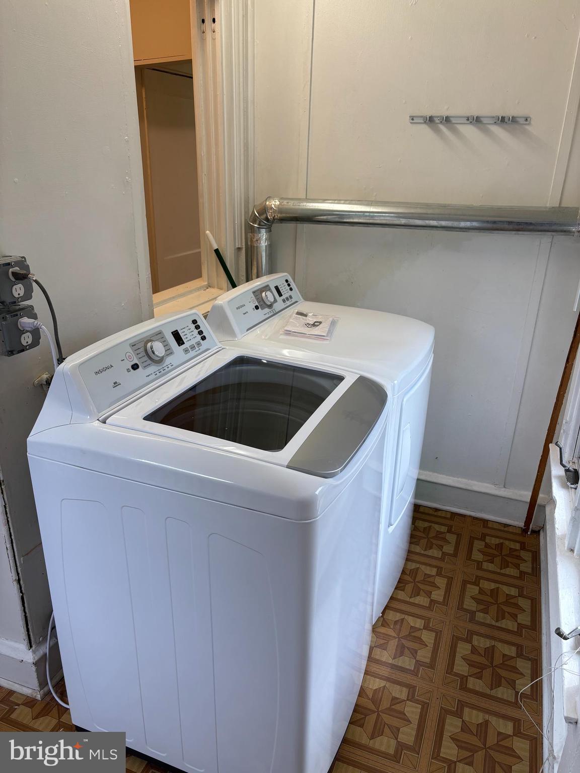 633 Edge Hill Road, Unit 1 Glenside, PA 19038 - Photo 7 of 13 a utility room with dryer and washer