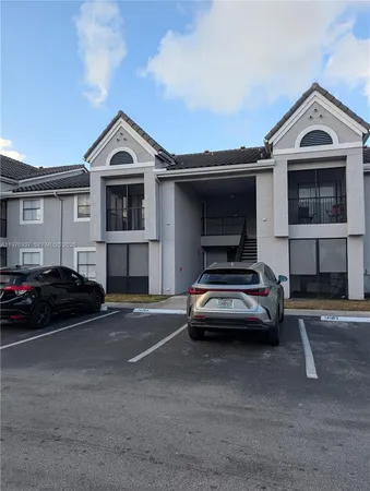 a car parked in front of a house