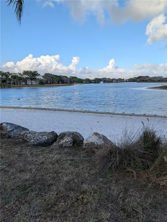 a view of a backyard of a house