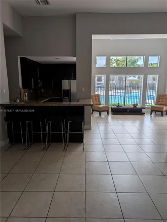 a view of a chairs and a room in a room