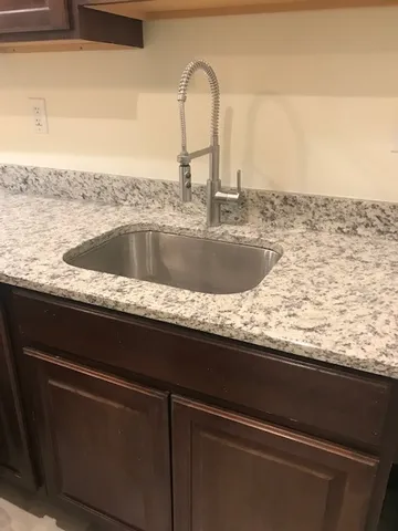 a close view of sink and tap