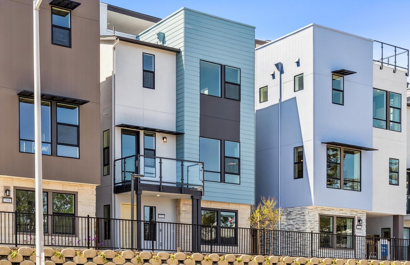 a front view of a building with glass windows