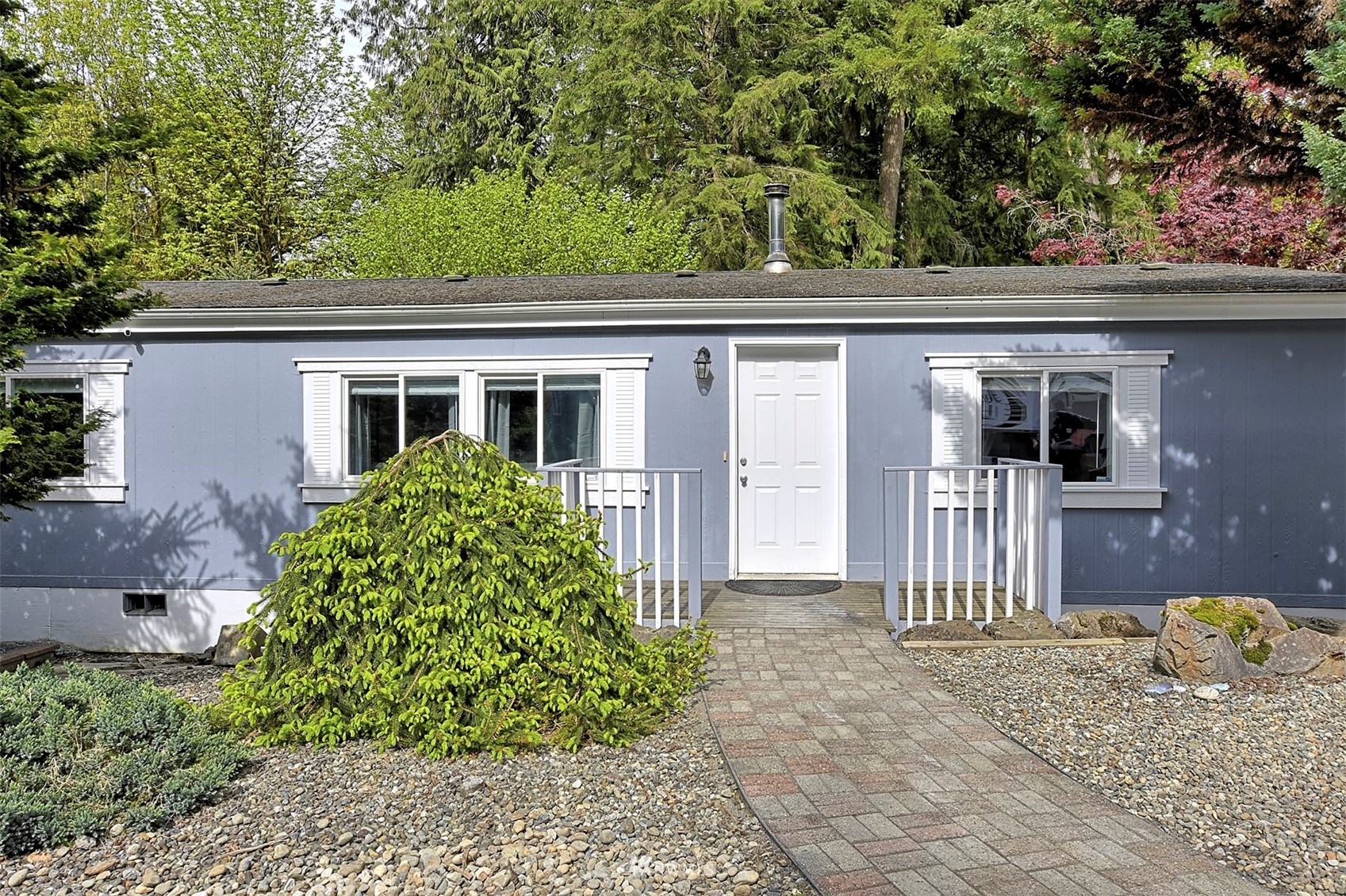 6320 Robe Menzel Road Granite Falls, WA 98252 - Photo 26 of 27 front view of a house with a garden