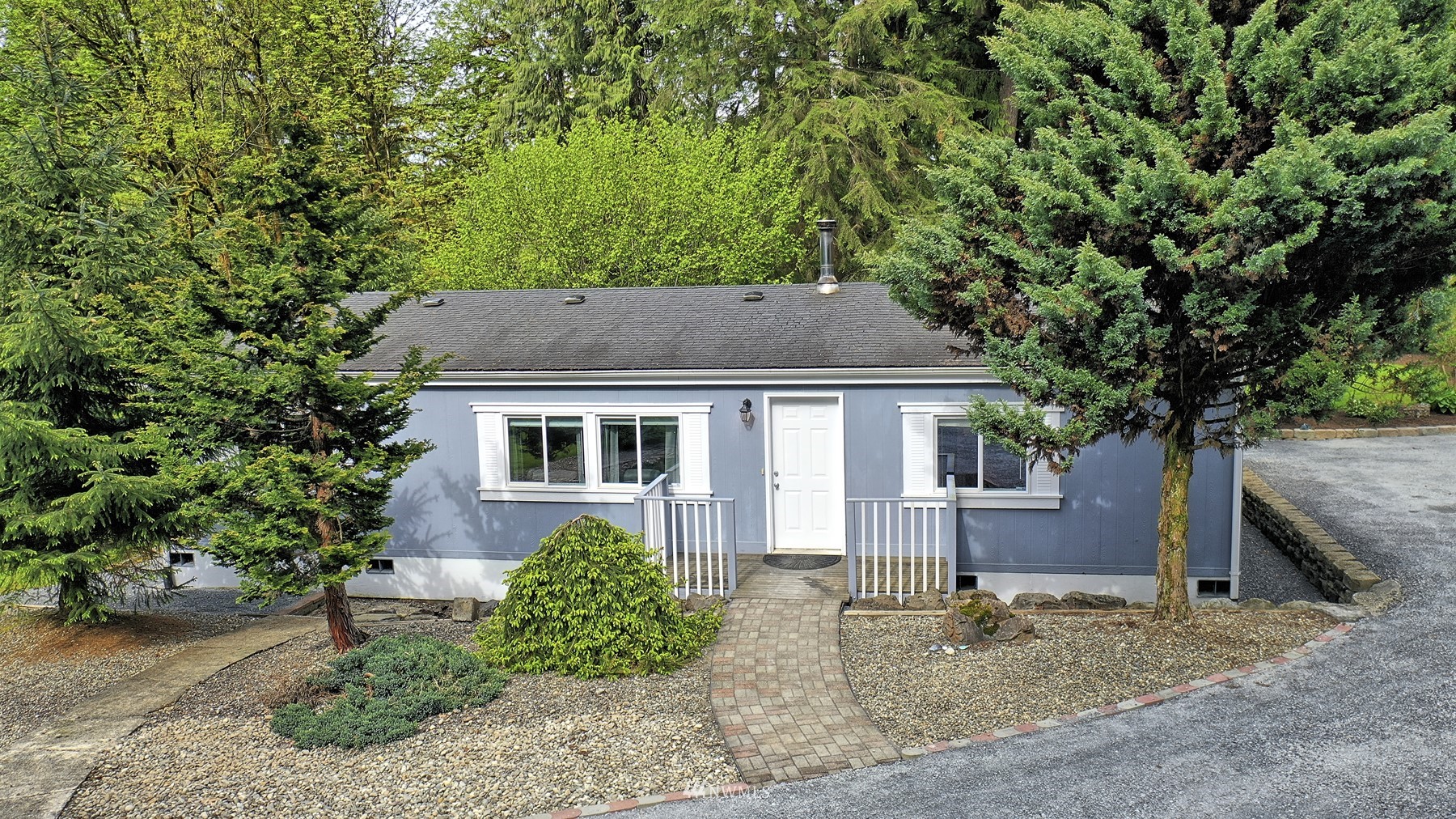 6320 Robe Menzel Road Granite Falls, WA 98252 - Photo 27 of 27 a house with a tree in front of it
