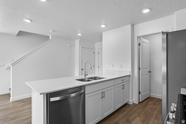 2194 Wolverine Way, Unit 2531 Washington, UT 84780 - Photo 13 of 52 Kitchen island featuring a dual-basin stainless steel sink with a gooseneck faucet