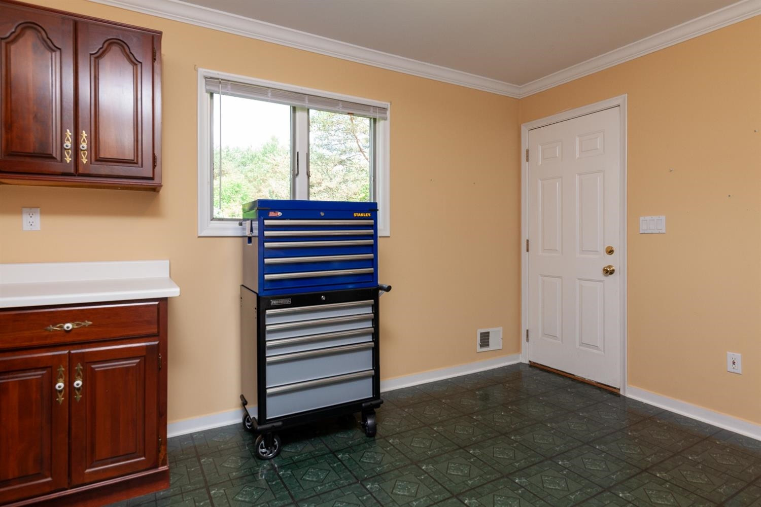 5210 West Joy Road Dexter, MI 48130 - Photo 11 of 39 Laundry, door exits to exterior.