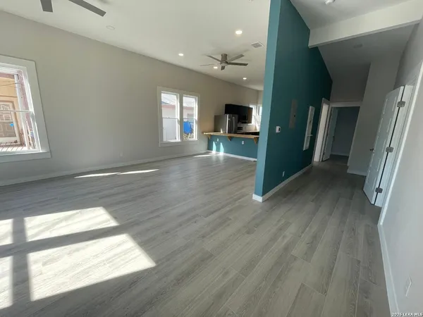 a view of livingroom with furniture and window