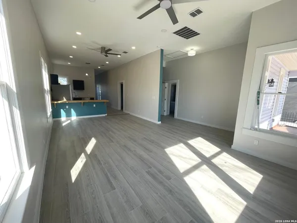 a view of entryway and kitchen