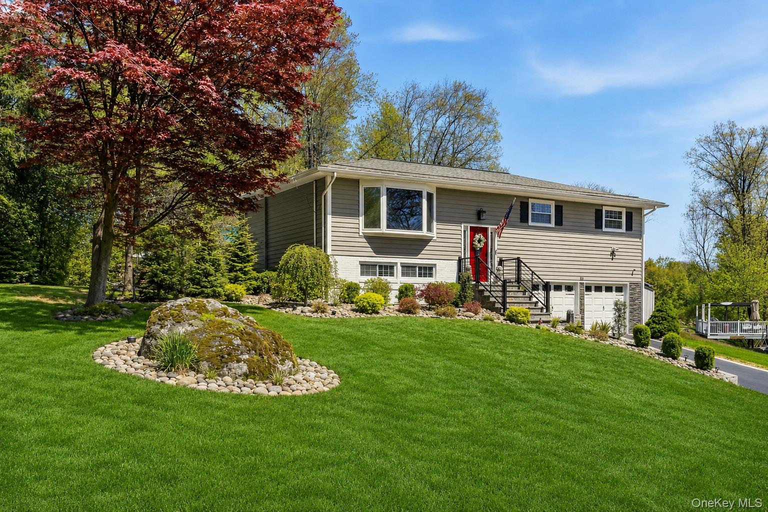 56 Tanager Road Mahopac, NY 10541 - Photo 2 of 30 a view of a house with a backyard