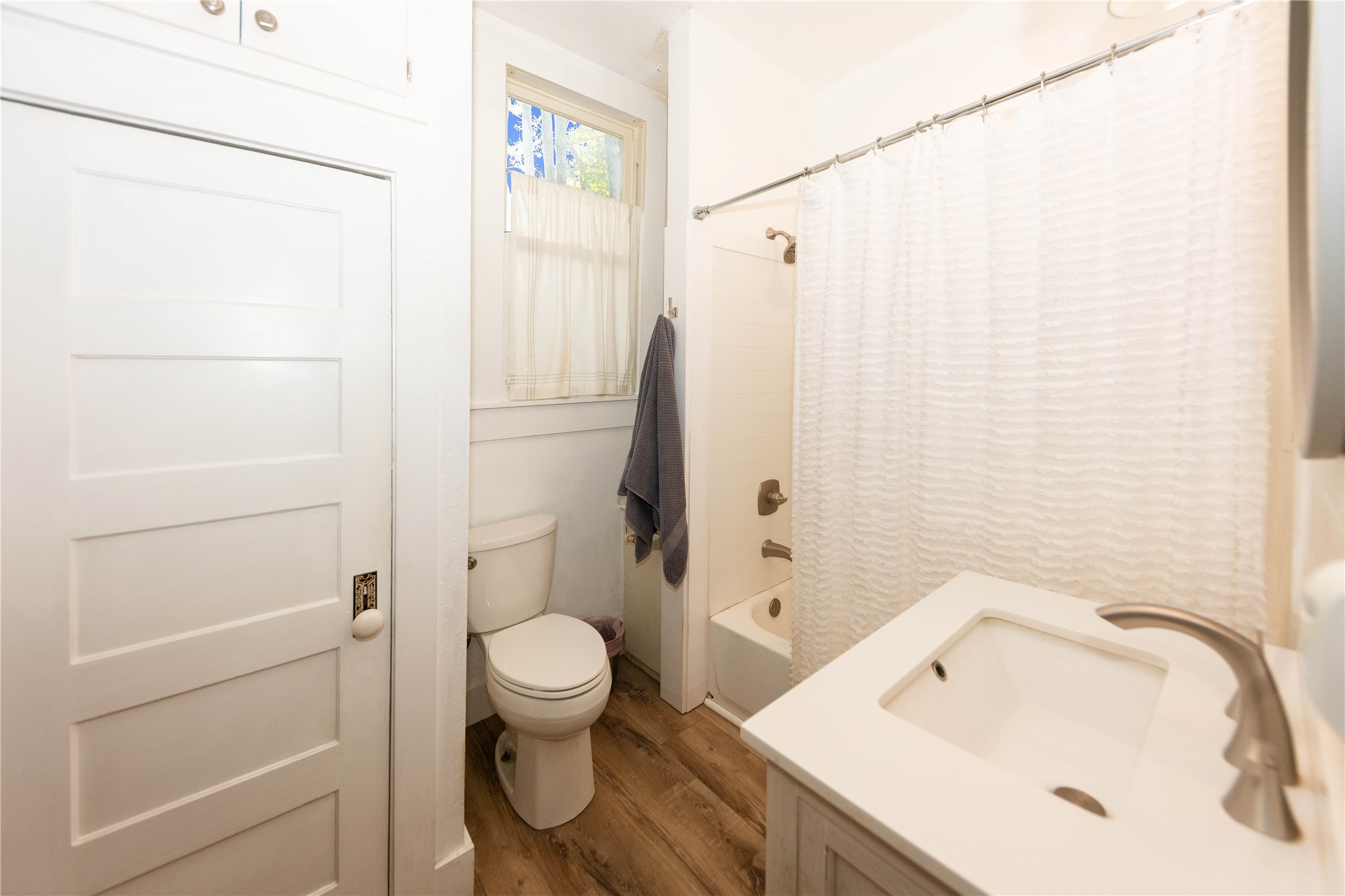 1202 Pecan Street Bastrop, TX 78602 - Photo 21 of 38 a bathroom with a sink and toilet