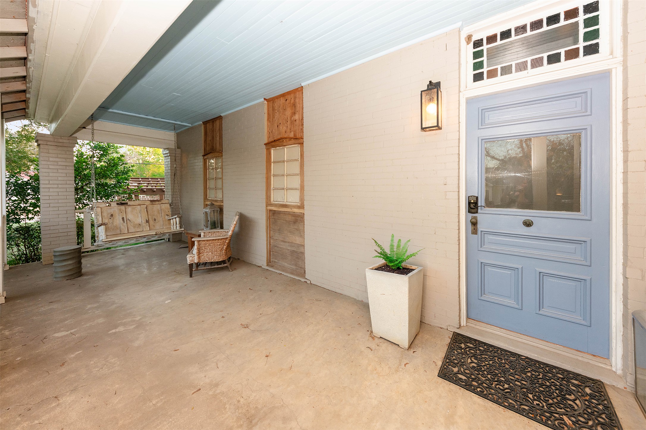 1202 Pecan Street Bastrop, TX 78602 - Photo 22 of 38 a view of an entryway with wooden floor and a garden