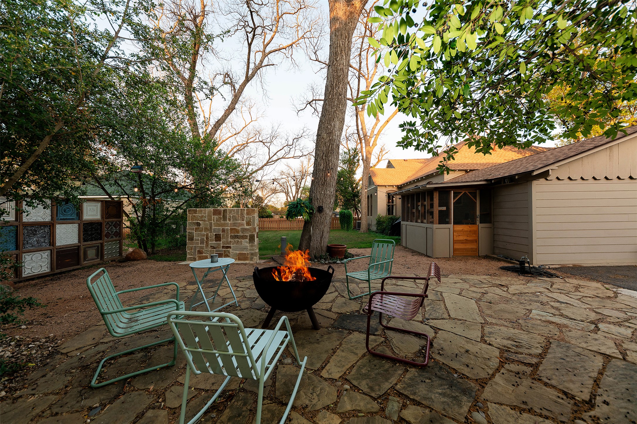 1202 Pecan Street Bastrop, TX 78602 - Photo 30 of 38 a backyard of a house with outdoor seating