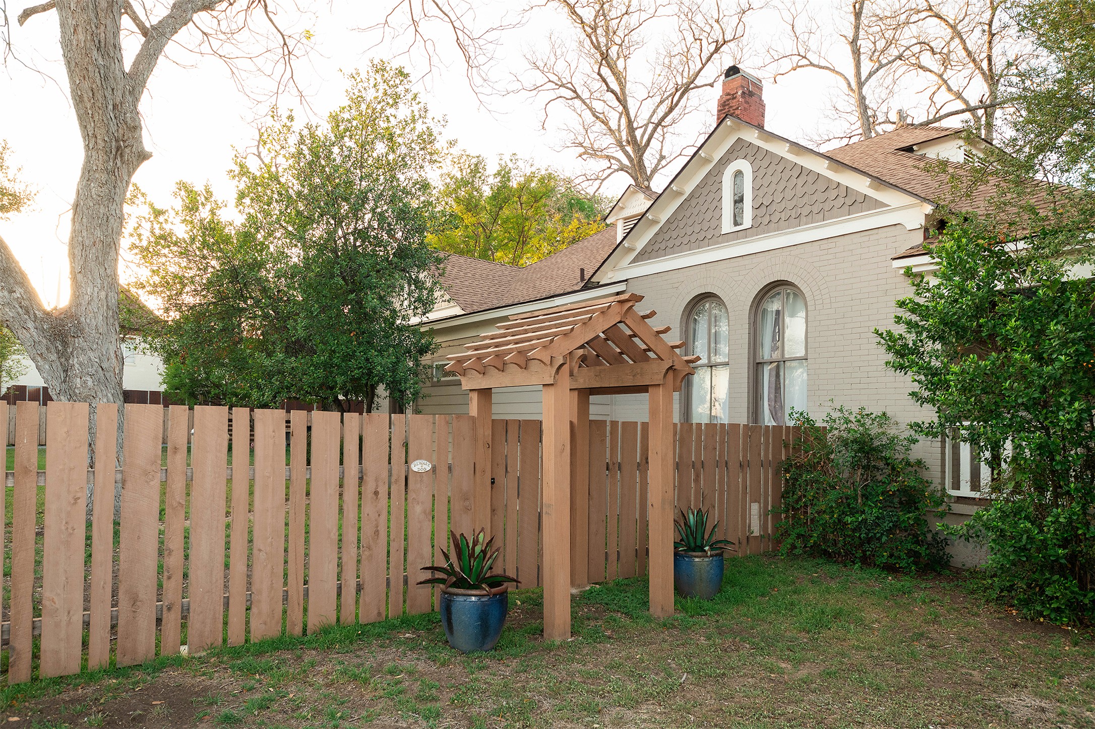 1202 Pecan Street Bastrop, TX 78602 - Photo 38 of 38 a front view of a house with garden