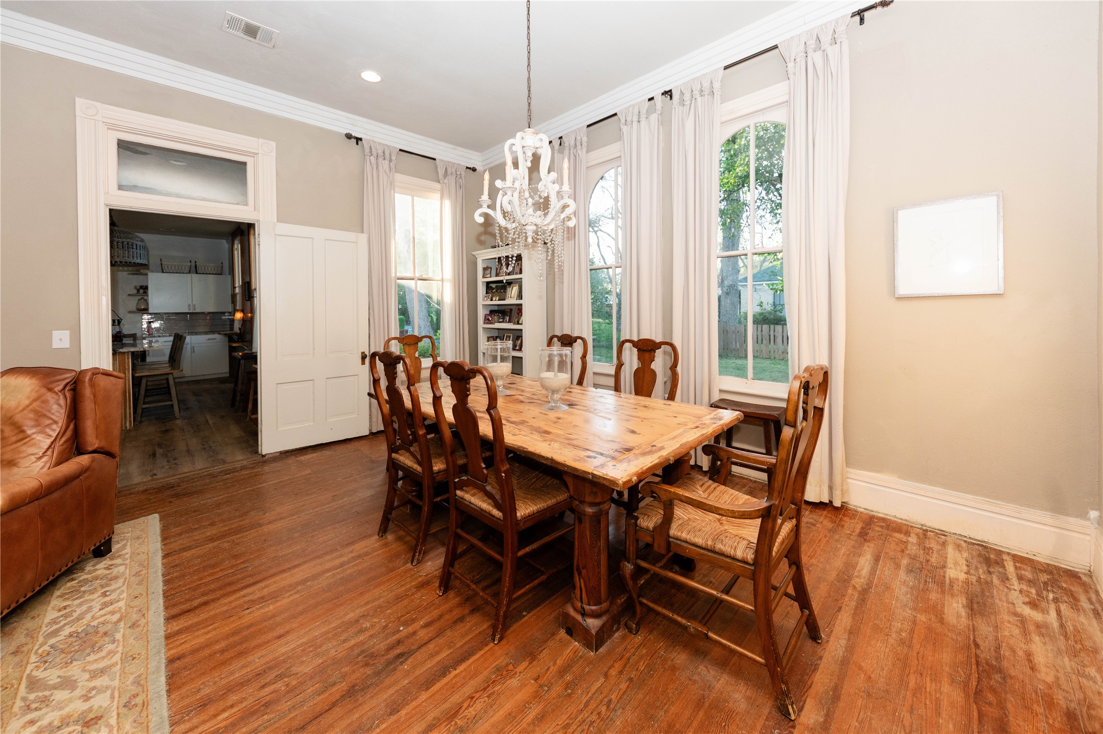 1202 Pecan Street Bastrop, TX 78602 - Photo 10 of 38 a view of a dining room with furniture window and wooden floor