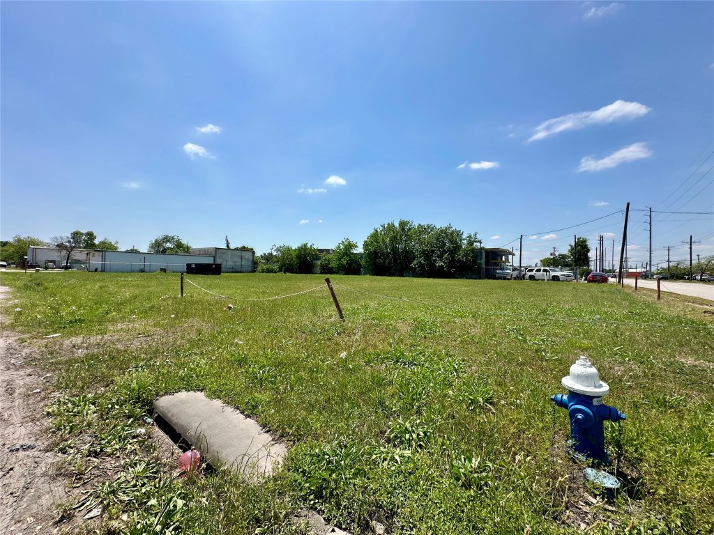 0 Heffernan Street Houston, TX 77087 - Photo 3 of 8 a view of a golf course with a lake
