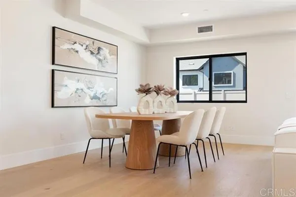 a bedroom with bed and a window