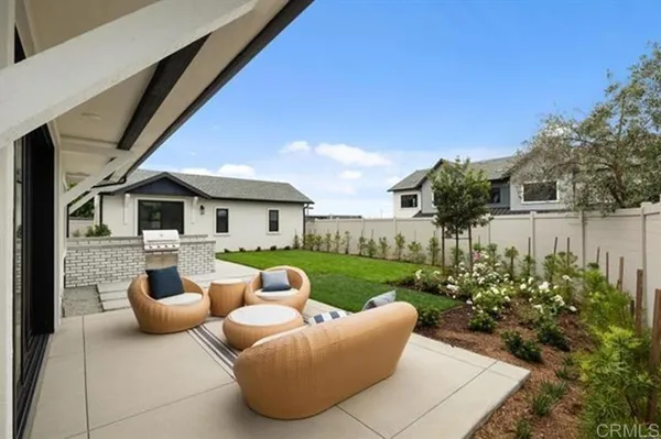 a view of a house with a clock on the wall