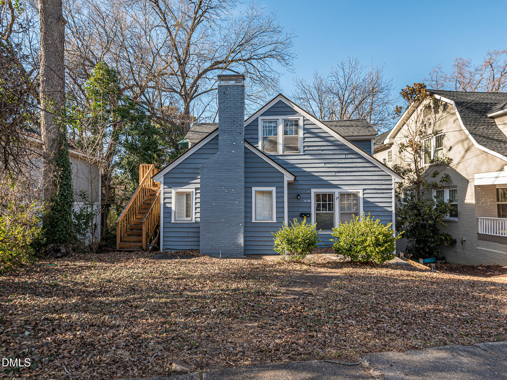 1825 White Oak Road Raleigh, NC 27608 - Photo 2 of 35 a view of a house with a yard and plants