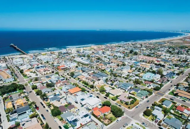 an aerial view of beach and ocean