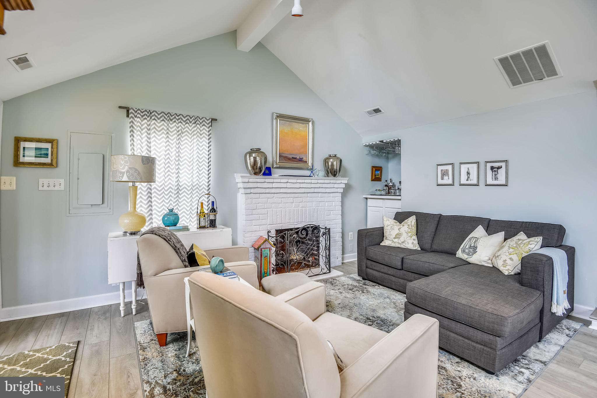1218 West River Road Shady Side, MD 20764 - Photo 21 of 50 Living room with wood burning fp. (as is)