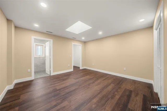 a view of a house with wooden deck