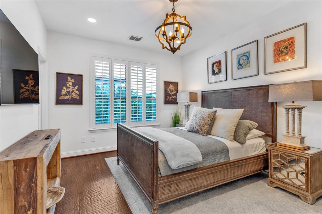 5744 Robbie Road Plano, TX 75024 - Photo 23 of 32 Bright interior with wood-finish flooring and recessed lighting