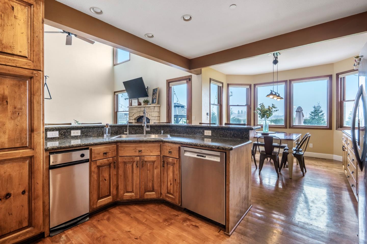 2760 Leavesley Road Gilroy, CA 95020 - Photo 11 of 77 a open kitchen with stainless steel appliances granite countertop a stove and cabinets