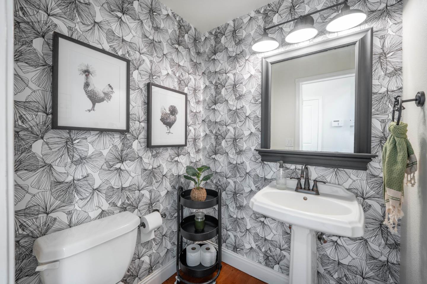2760 Leavesley Road Gilroy, CA 95020 - Photo 20 of 77 a bathroom with a toilet sink and mirror