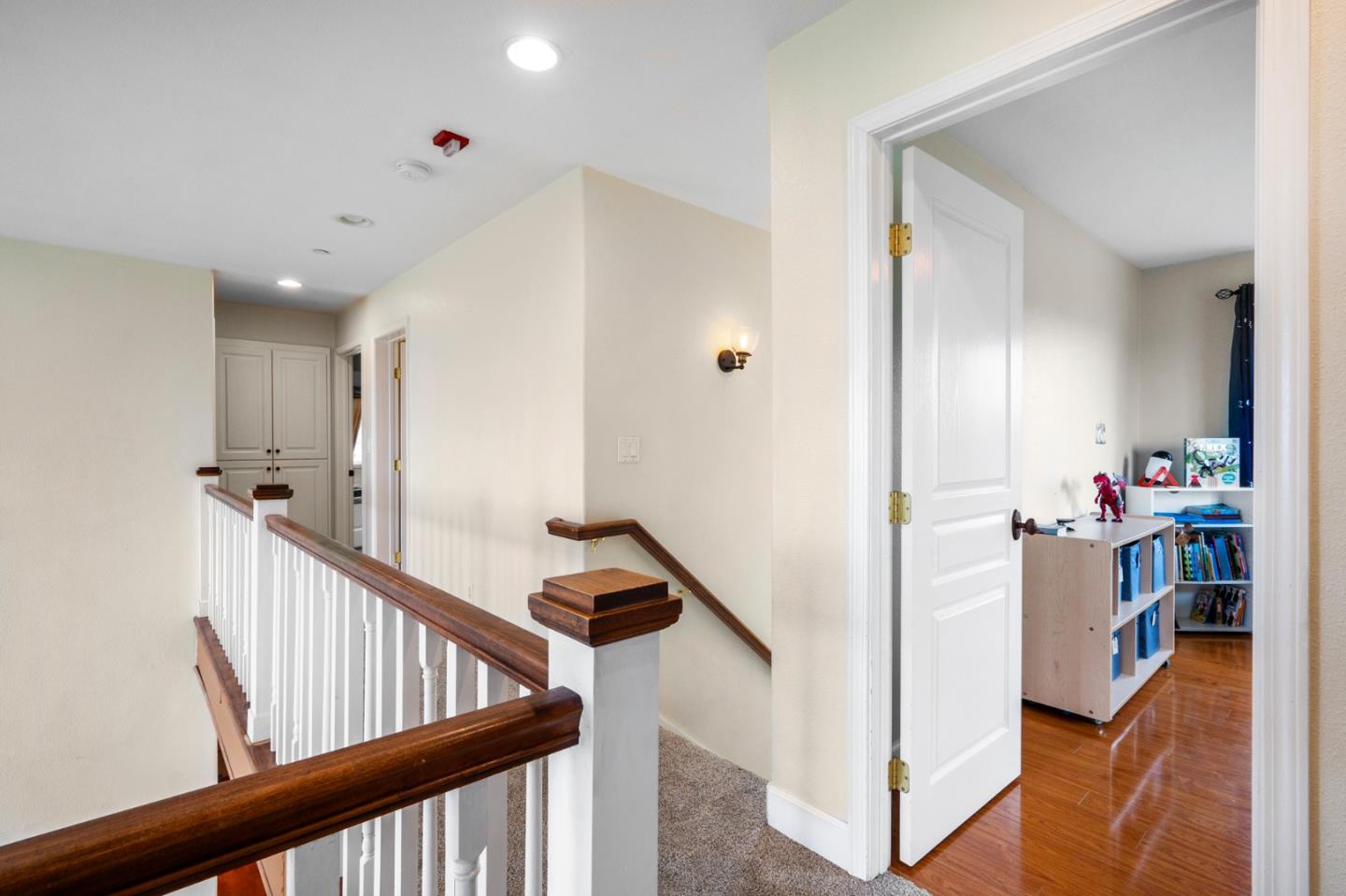2760 Leavesley Road Gilroy, CA 95020 - Photo 21 of 77 a view of a hallway with workspace and livingroom with furniture
