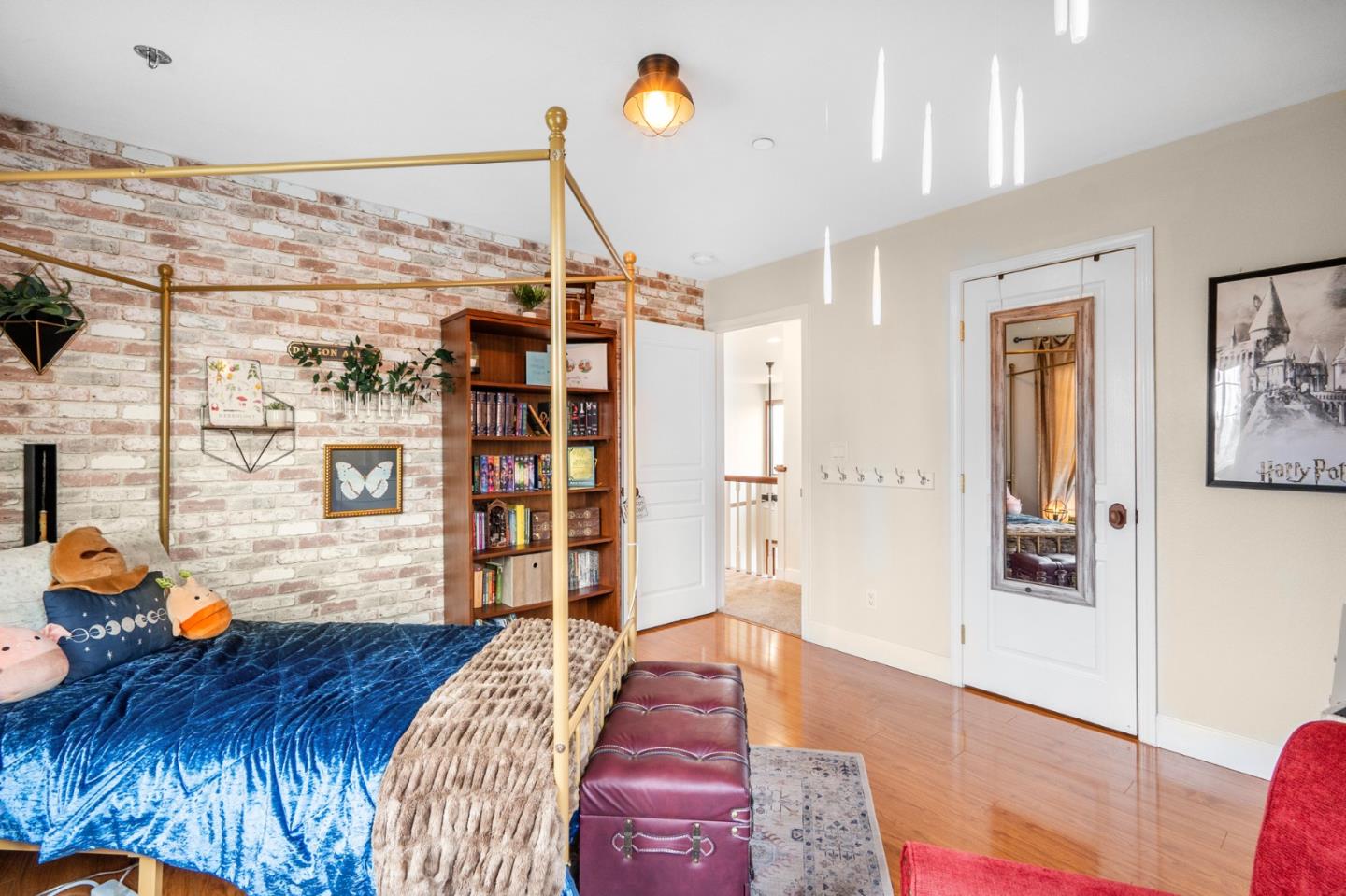 2760 Leavesley Road Gilroy, CA 95020 - Photo 22 of 77 a bedroom with a bed and wooden floor