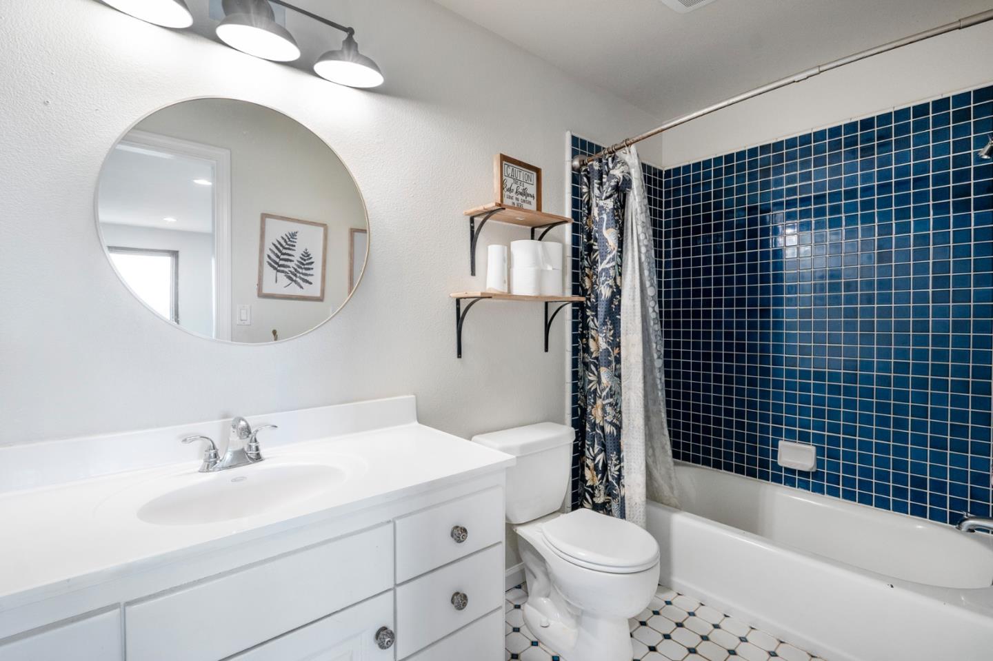 2760 Leavesley Road Gilroy, CA 95020 - Photo 24 of 77 a bathroom with a sink a toilet and shower