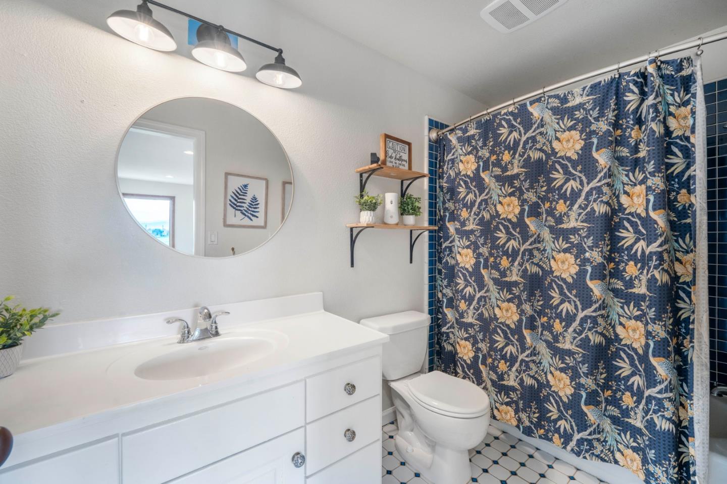 2760 Leavesley Road Gilroy, CA 95020 - Photo 25 of 77 a bathroom with a sink toilet and shower