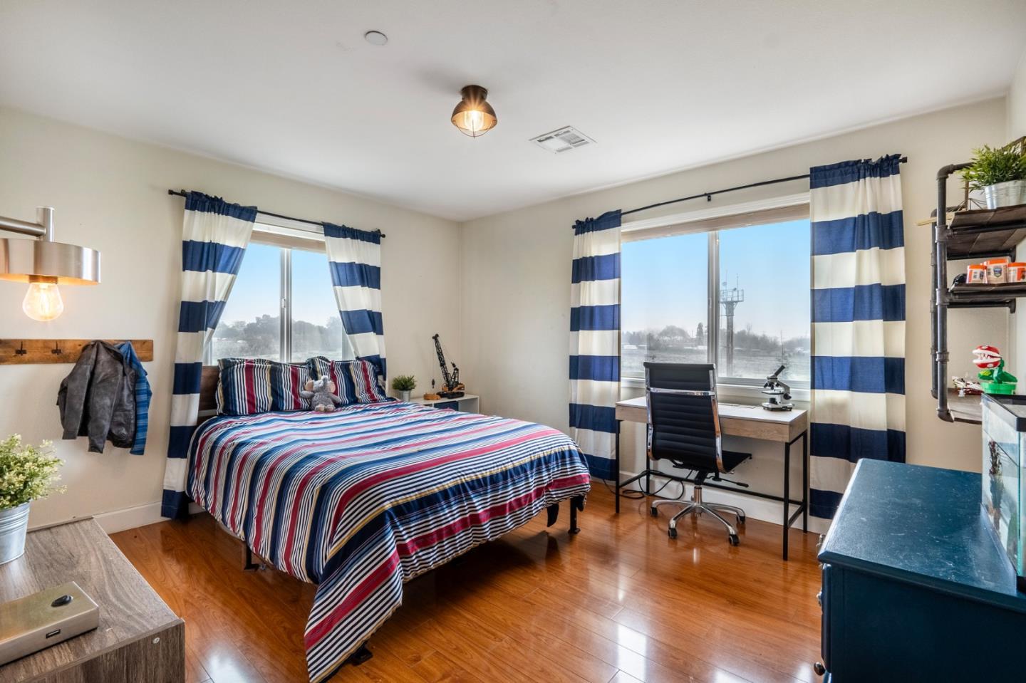 2760 Leavesley Road Gilroy, CA 95020 - Photo 30 of 77 a bed room with a bed and a chair