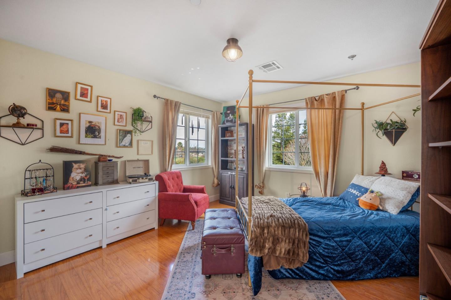 2760 Leavesley Road Gilroy, CA 95020 - Photo 34 of 77 a bedroom with a bed window and wall painting