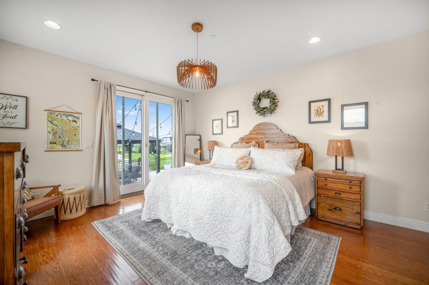 2760 Leavesley Road Gilroy, CA 95020 - Photo 36 of 77 a large bedroom with a bed and wooden floor