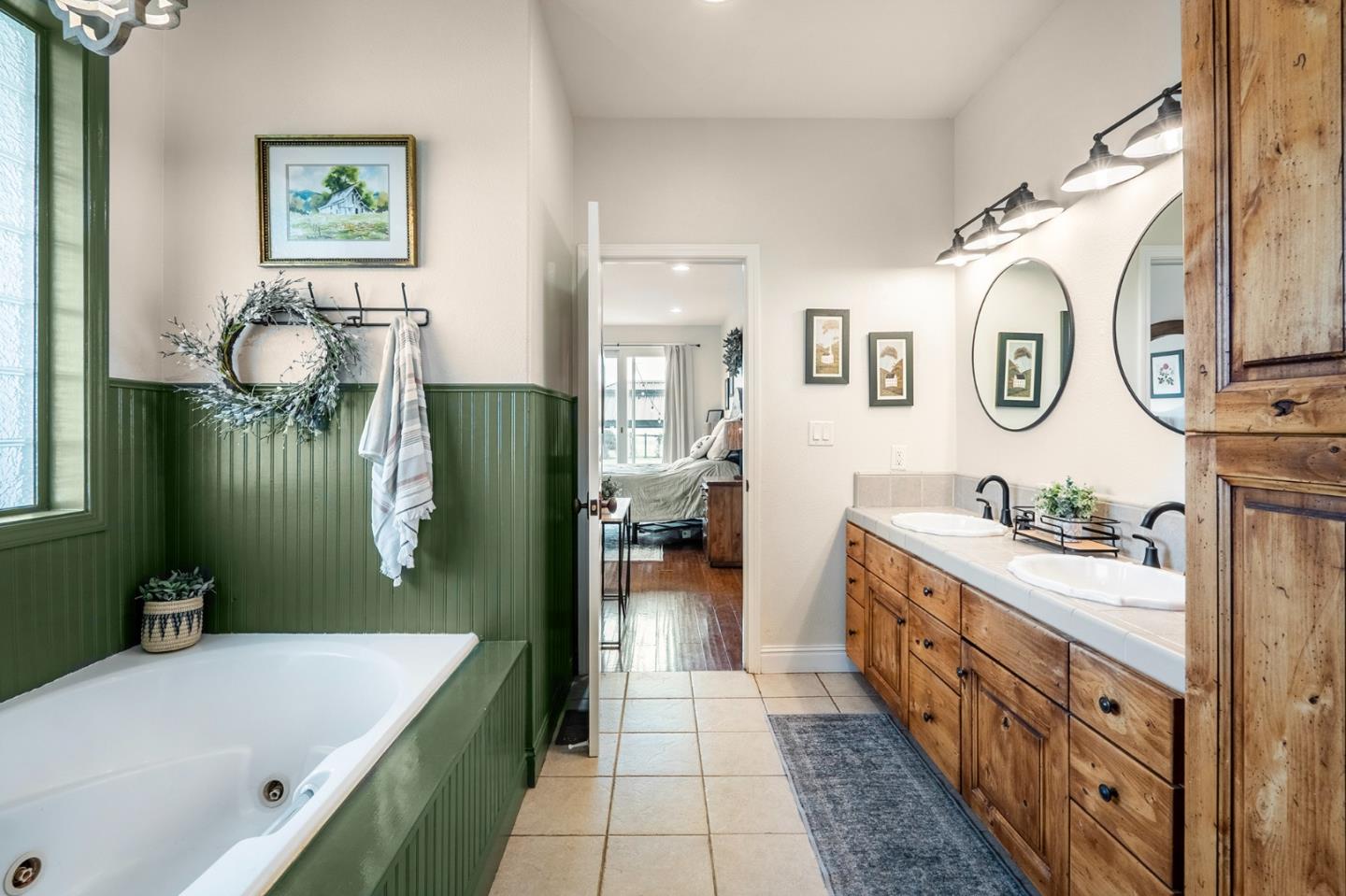 2760 Leavesley Road Gilroy, CA 95020 - Photo 38 of 77 a spacious bathroom with a sink a mirror and a bathtub