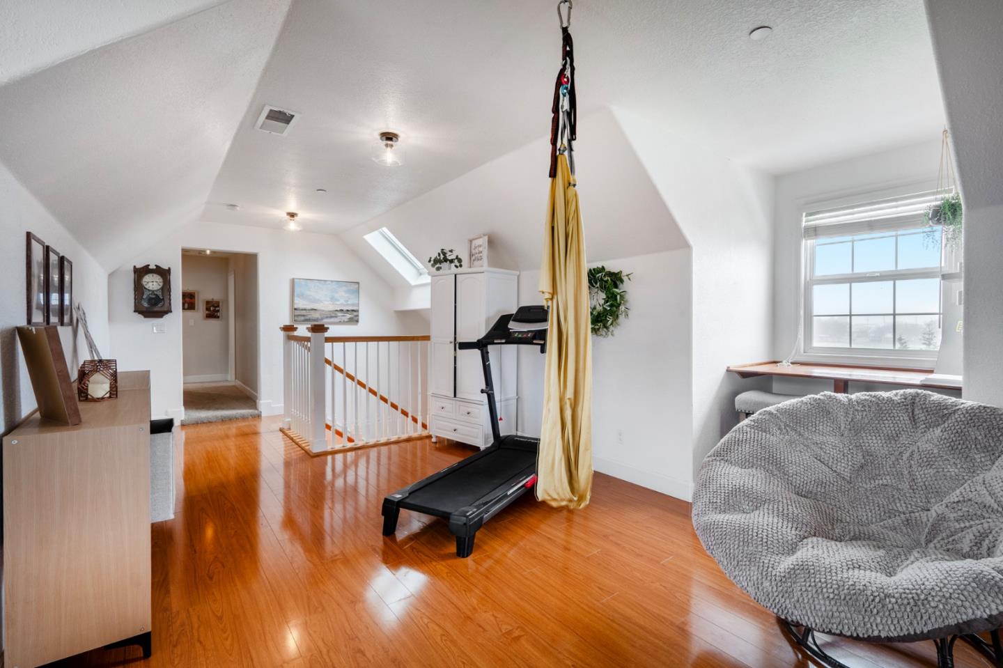 2760 Leavesley Road Gilroy, CA 95020 - Photo 43 of 77 a living room with lots of furniture and a wooden floor