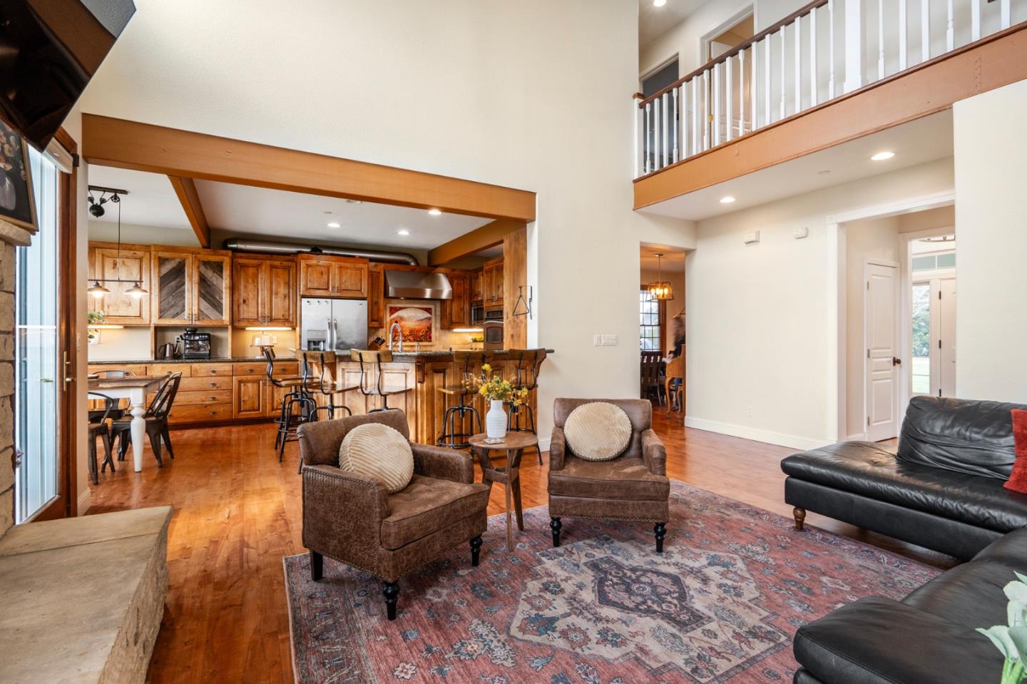 2760 Leavesley Road Gilroy, CA 95020 - Photo 6 of 77 a living room with furniture a rug and a floor to ceiling window