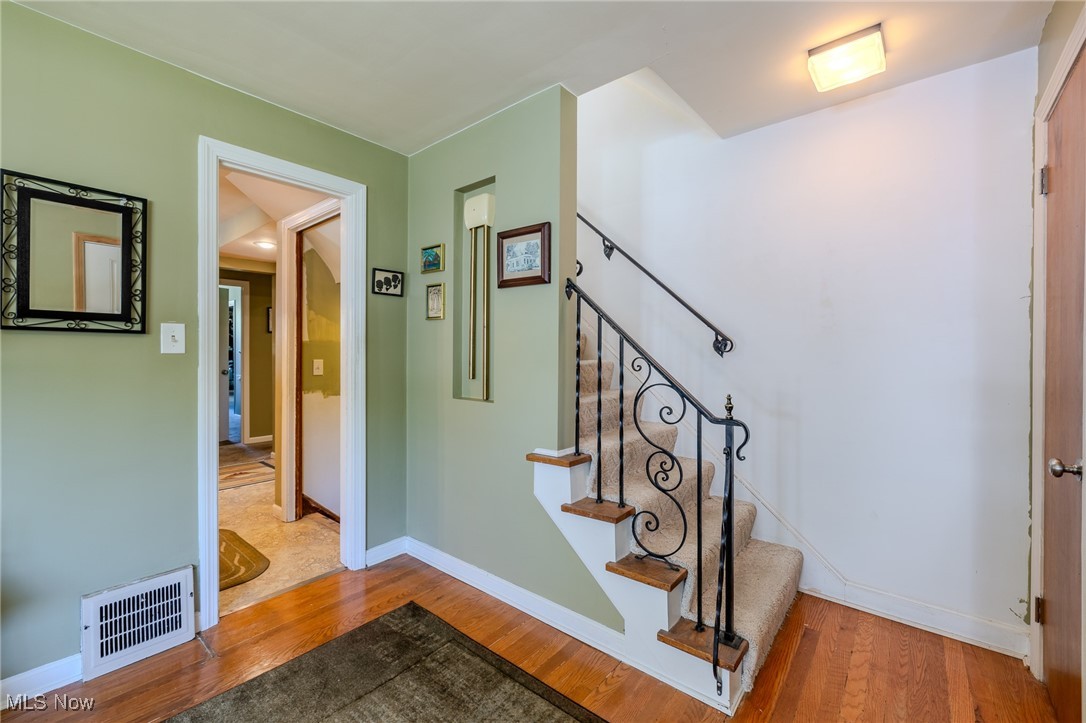 4959 Anderson Road Cleveland, OH 44124 - Photo 30 of 43 Stairway featuring wood finished floors
