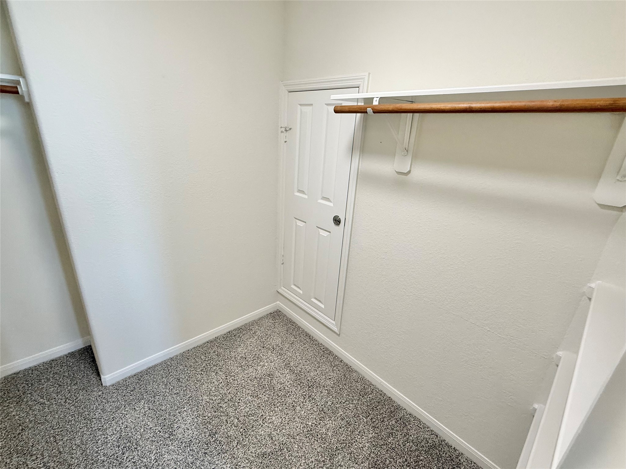 3430 Falcon Trail Court Spring, TX 77373 - Photo 26 of 31 Another view of the primary walk-in closet, with access to the walk-in attic.