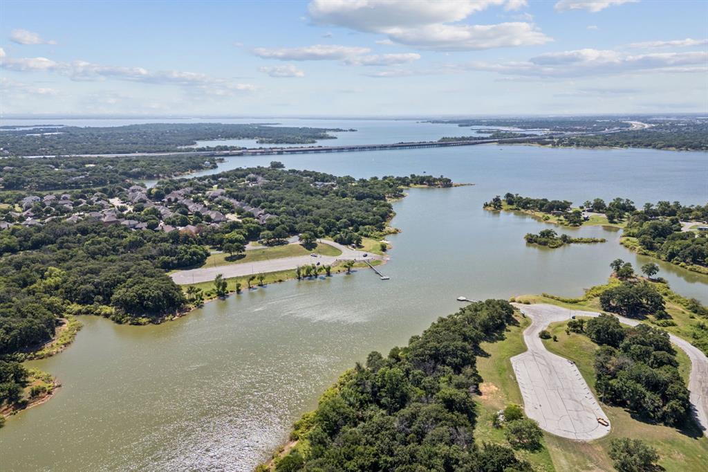 1155 Point Vista Road Hickory Creek, TX 75065 - Photo 7 of 21 an aerial view of ocean and residential houses with outdoor space
