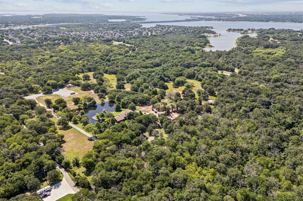 1155 Point Vista Road Hickory Creek, TX 75065 - Photo 9 of 21 a view of a city with green field