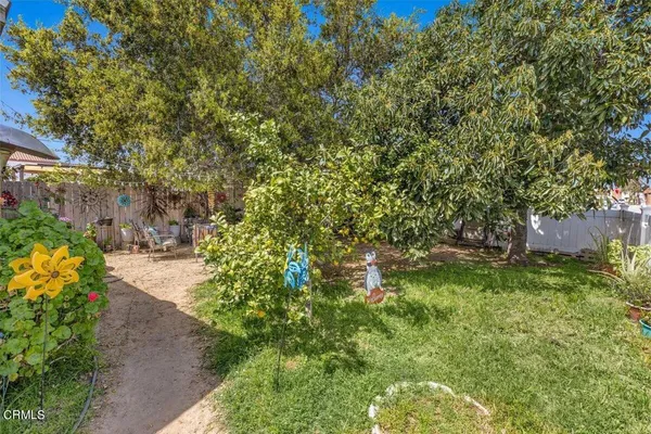 a backyard of a house with lots of green space