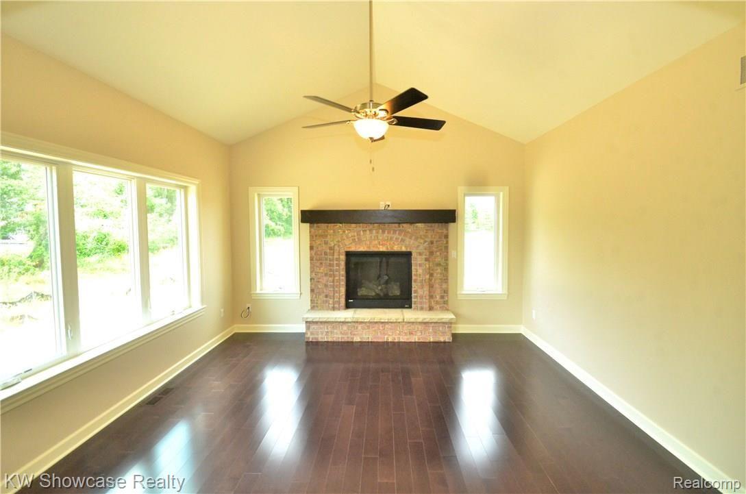 4131 Inverrary Court Commerce Township, MI 48382 - Photo 10 of 34 Hearth Room with Fireplace